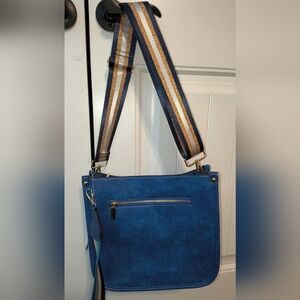 Elegant Blue Crossbody Bag with Striped Strap